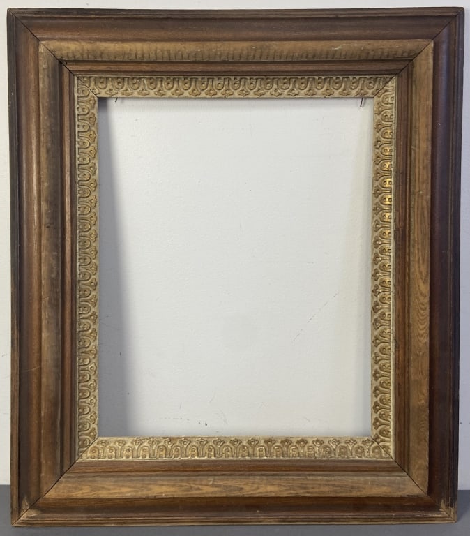 Antique 19th Century Carved Wood Frame Large wooden frame with carved shapes painted gold. Frame: Large wooden frame with carved shapes painted gold. Frame measured from the outside is 28 X 32 inches in size. Interior opening is 18 X 22 inches in size.