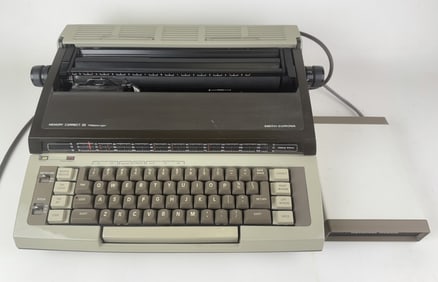 Smith-Corona Memory Correct II Typewriter With Messenger Modilule. Powers on. Otherwise untested. 16