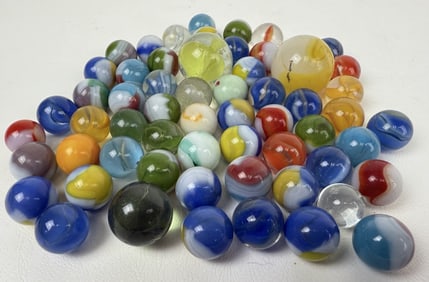 Vintage Glass Marbles Lot Some chips and knocks present on the larger ones. 5 x 1 inches bagged.