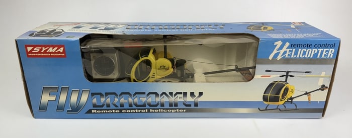 Syma Dragonfly Remote Control Helicopter With box. Untested. 26 x 7.5 x 6 inches.