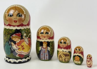 Wooden Russian Nesting Dolls 5 dolls. Good condition. Largest 7 x 3 inches.