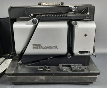 Vintage Telex Instaload XL 16mm Film Projector Model 2210. Ser No 1505. Powers on. Some rust