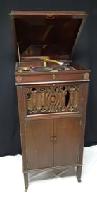 Vintage Silvertone Phonograph H14154 Measures 21 x 22 x 48 inches tall. Untested, no key. Door that