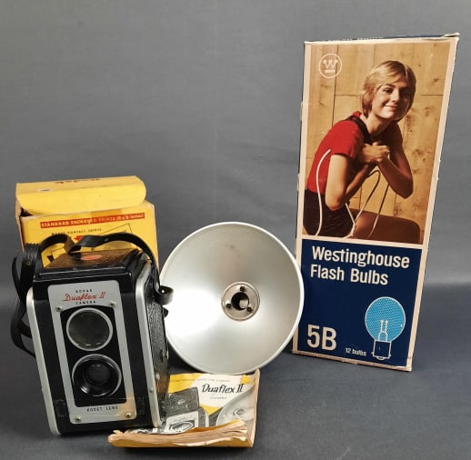 Kodak Duaflex II TLR Camera & Box Flash & Bulbs Camera measures 3 x 3 x 5 inches. Strap is sticky. (1 of 15)