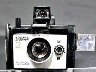 Vintage Polaroid Square Shooter 2 Land Camera×××××÷ Measures 6x5x6 inches tall. Untested.