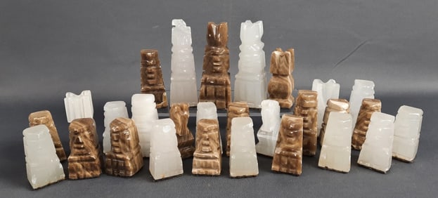 Stone Carved Assorted Chess Pieces 28 pieces total measuring 2 to 4 inches each. Multiple chips