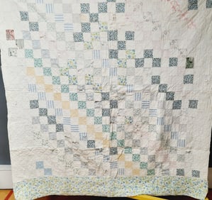 Vintage Handmade Quilt Measures approximately 82x69 inches. Some significant staining and multiple