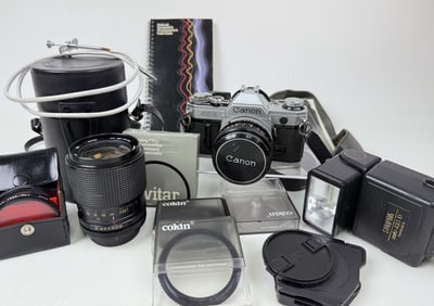 Canon AE-1 35mm Camera Lot Includes items in photos-lens, speedlite, filters etc. untested. 10 x 9 x