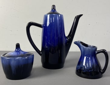 Blue Mountain Pottery Coffee Set of Three Set includes coffee pot, sugar bowl, and creamer in a blue
