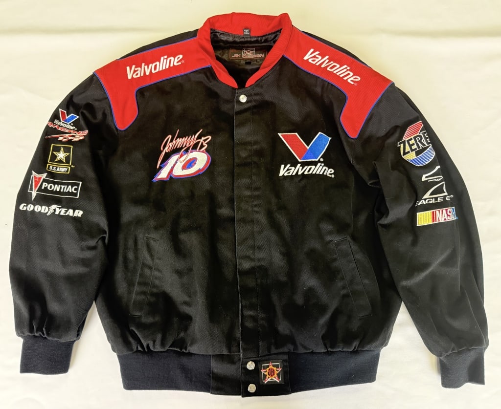 Johnny Benson NASCAR Jacket JH Designs XL Good condition free of holes tears or stains. Buttons: XL Good condition free of holes tears or stains. Buttons intact and working. See photos for measurements. 14x14x6 inches folded.