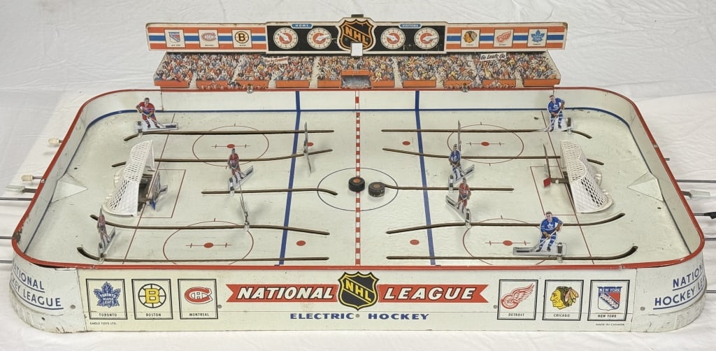Vintage Eagle Toys Electric Hockey Game 556 Electronics untested. Signs of age and wear including: Electronics untested. Signs of age and wear including scuffs, scratches missing stick grips, paint loss and staining. Please see photos for conditions details. Approximately 37 x 20 x 4 inches.