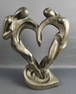Soulmates Austin Durastone Sculpture Measures 13 x 16 inches tall. Few marks present near the base.