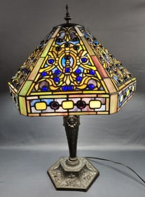 1971 Tiffany Style Stained Glass Table Lamp Works. Lamp measures 24" tall. Lamp is dented and bent