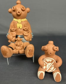 Navajo Mudhead Storyteller Pottery Dolls Set of 2. They measure 6.5 in and 3.5 in.