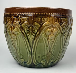 Majolica Flower Pot 7 inches tall 8 inches wide at opening. Crazing present overall. Chip on foot.
