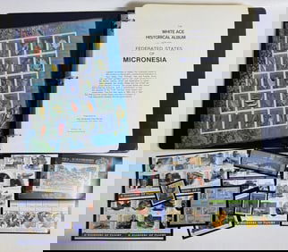 Micronesia Stamp Collection Album Partially filled binder 12 x 10 x 2 inches. With extra supplement