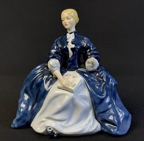 Royal Doulton Figurine HN 2179 Laurianne 6.5 inches tall by 7 inches wide. Free of chips or cracks.