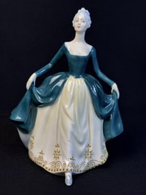 Royal Doulton Figurine HN 2709 Regal Lady 7.5 inches by 6 inches wide. Free of chips or cracks