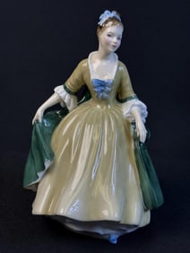 Royal Doulton Figurine HN 2264 Elegance 7.5 inches tall by 5 inches wide. Free of chips or cracks.