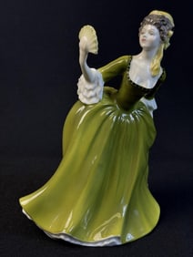 Royal Doulton Figurine HN 2378 Simone 7.5 inches tall by 6 inches wide. Free of chips or cracks.