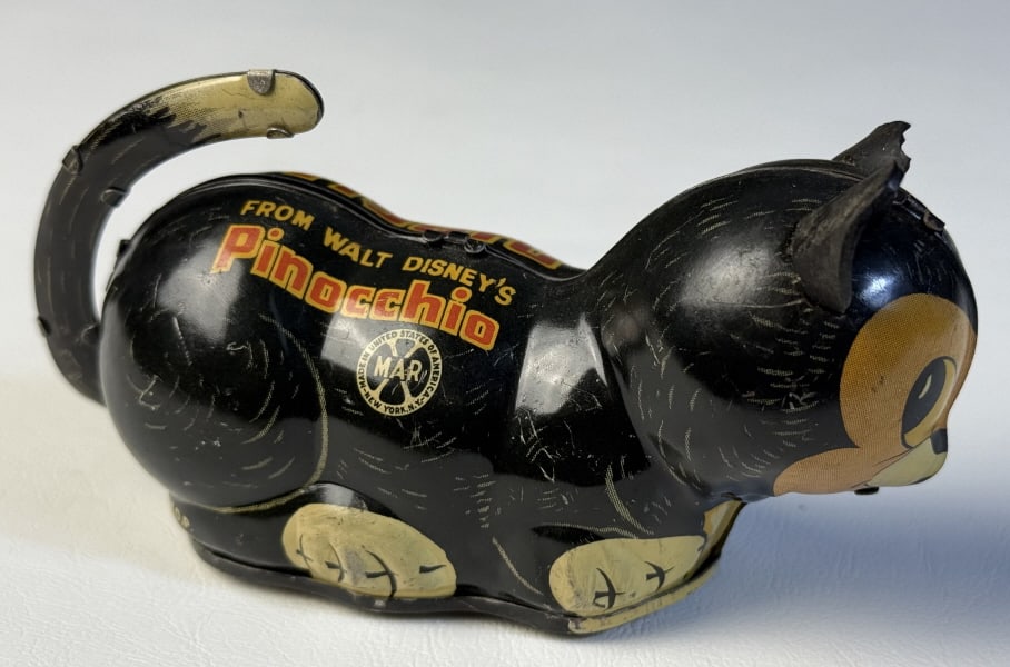 Vintage Marx Tin Toy Wind Up Figaro Disney From Pinocchio. Missing key. One ear damaged. 5 x 3 x 2: From Pinocchio. Missing key. One ear damaged. 5 x 3 x 2 inches.