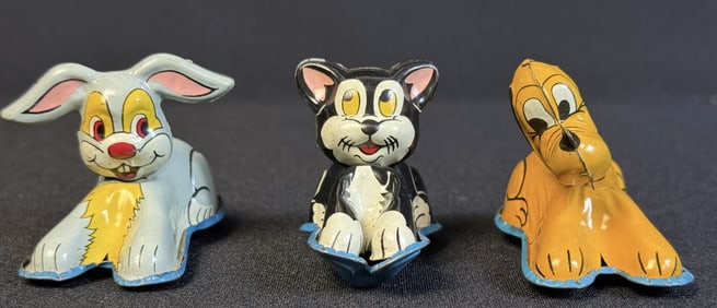 Vintage Disney Linemar Friction Tin Toy Lot Thumper, Figaro and Pluto. Figaro has bend between legs.