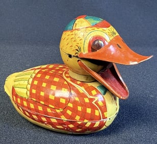 Vintage Tin Litho Friction Toy Duck Mouth opens and closes. 4 x 3 x 2 inches.