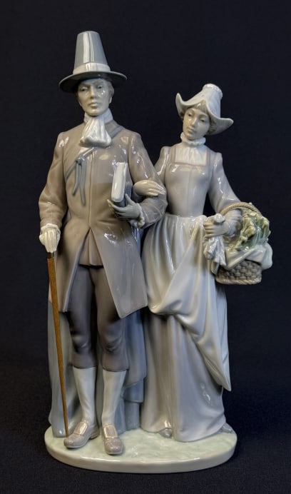 Lladro Porcelain Figurine 5734 Pilgrim Couple With wooden cane. 12 inches tall 6 inches wide. Good: With wooden cane. 12 inches tall 6 inches wide. Good condition free of cracks or chips.