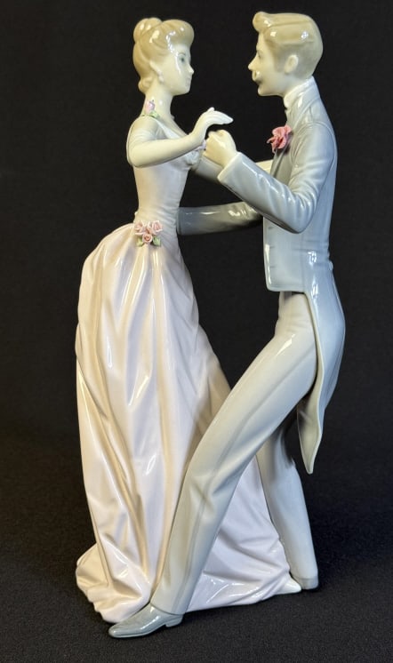 Lladro Porcelain Figurine 1372 Anniversary Waltz 12 inches tall by 6 inches wide. Small crack near: 12 inches tall by 6 inches wide. Small crack near bottom see photos. Otherwise free of damage.