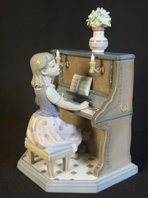 Lladro Porcelain Figurine 5462 Practice Makes Perfect 8 x 6 x 6 inches. Good condition free from