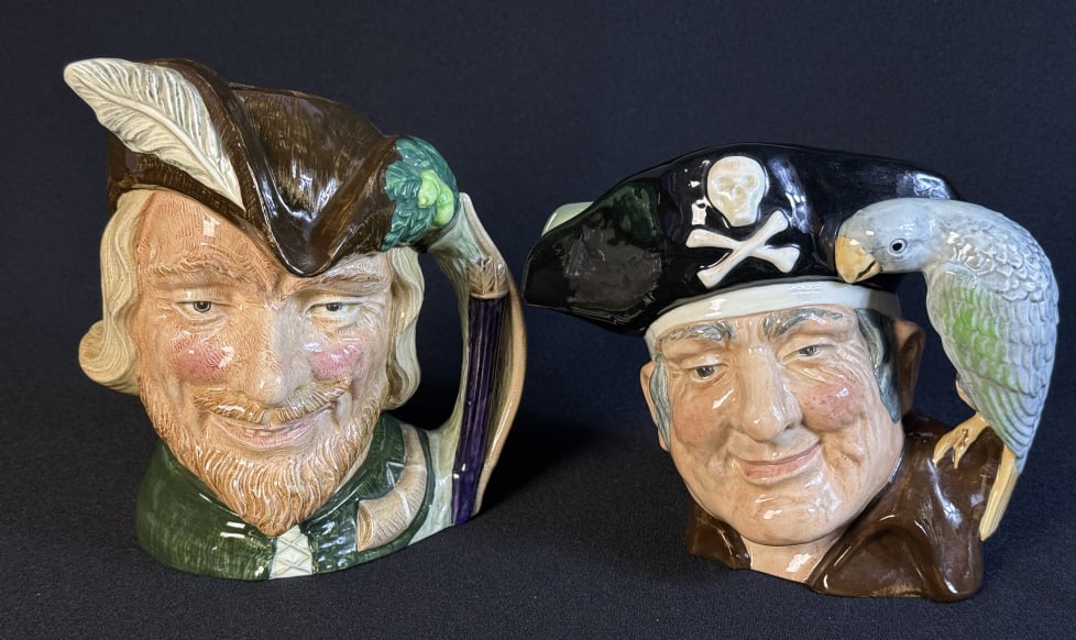 Royal Doulton Character Toby Mugs Robin Hood D 6527 Long John Silver D 6335. No chips or cracks. 7 x: Robin Hood D 6527 Long John Silver D 6335. No chips or cracks. 7 x 6 inches.