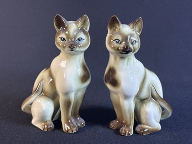 Vintage Ceramic Siamese Cat Figurines Mirrored pair. 6.5 inches tall by 4 inches wide. Some crazing