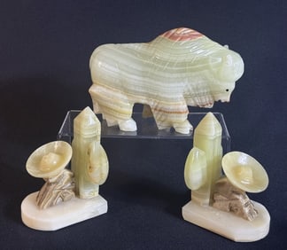 Carved Alabaster Onyx Marble Bookends Buffalo Buffalo measures 5 inches tall by 7 inches long. One