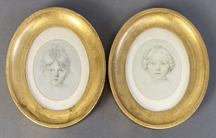 Girl Portraits on Fabric Made in Italy Two Italian portraits of young girls in oval gold frames.