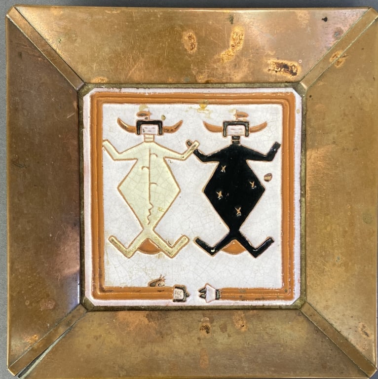 Aluminum & Tile Native American Style Tray Tray made of copper colored aluminum with a tile: Tray made of copper colored aluminum with a tile featuring two figures in the center. Marked on the back Handmade DHC. Tray is 9 1/2 X 9 1/2 inches in size.