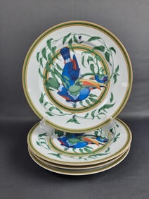 4 Hermes Toucans Dinner Plates Plates measure 10.5 inches. Utensil marks, small chips in paint.