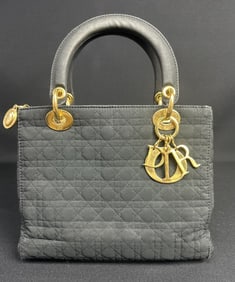 Small Black Dior Clutch Black quilted fabric Dior clutch mini handbag with gold hardware and red