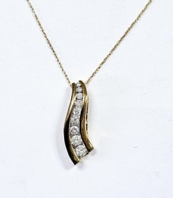 10K Yellow Gold Diamond Necklace 1/2 CTTW Necklace weighs 2.2 Grams Measures 18"