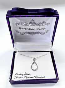 Sterling Silver 1/10 CTTW Genuine Diamond Necklace Necklace weighs 1.6 Grams Measures 19"