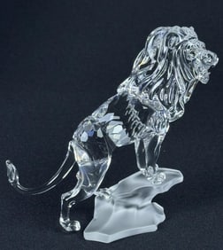 Swarovski Crystal Figurine Lion Standing on Rock With original outer box and inner hinged/latch box.