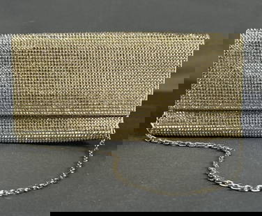 Judith Leiber Champagne Crystal Clutch Stunning Judith Leiber champagne rhinestone clutch with: Stunning Judith Leiber champagne rhinestone clutch with removable shoulder strap. Pristine like new condition, this girl is glowing. Perfect for a night out on the town, prom or whenever you’re feel