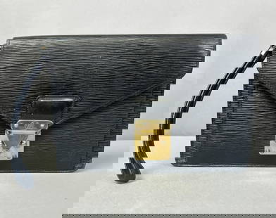 Louis Vuitton Black Leather Epi Clutch Louis Vuitton Epi Pochette Clutch. Minor wear in exterior: Louis Vuitton Epi Pochette Clutch. Minor wear in exterior leather, scuffing on metal hardware. Clean interior. Inner zipper pouch has significant wear and the zipper sticks. 10 in Width, 7 in Height,