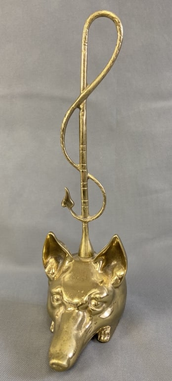 Virginia Metalcrafters Brass Fox Doorstop Brass fox head with curly tail attached to back. Doorstop: Brass fox head with curly tail attached to back. Doorstop is 15 1/2 inches tall and 4 1/4 inches wide. Marked VM on back.