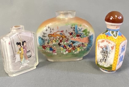 Antique Glass Chinese Snuff Bottles Three handpainted 19th century snuff bottles. Largest bottle's