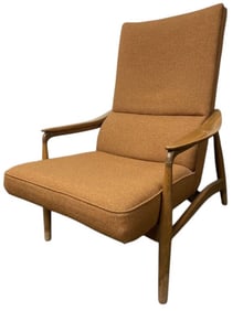 MCM Oak Lounge Chair Oak wood lounge chair with upholstered orange seat and back. Chair is 40 inches