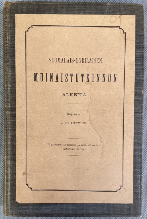 Antique Book in Finnish Language 1875 Finno-Ugril Studies in Antiquities by JR Aspelin, published by: Finno-Ugril Studies in Antiquities by JR Aspelin, published by the Finnish Literature Society, 1877. Includes woodcut illustrations and gold out map. Some staining on pages.