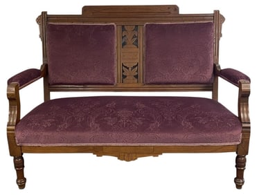 Edwardian Style Upholstered Settee Carved wood setter with purple velveteen upholstery. Settee is 34