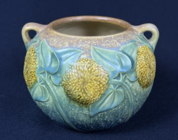Roseville Pottery Sunflower Handled Vase 4 inches tall by 5 inches wide. No chips or cracks. Some