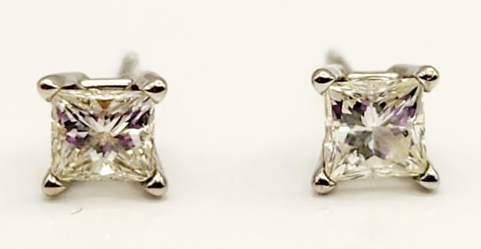 14K White Gold Diamond Stud Earrings Weighs 0.6 grams.
