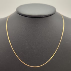 14K Yellow Gold Serpentine Link Chain Necklace Necklace is 15.5". Weighs 1.3 grams.
